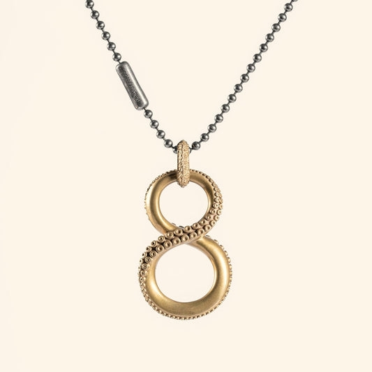 Gouden love knot hanger met verstrengelde ringen